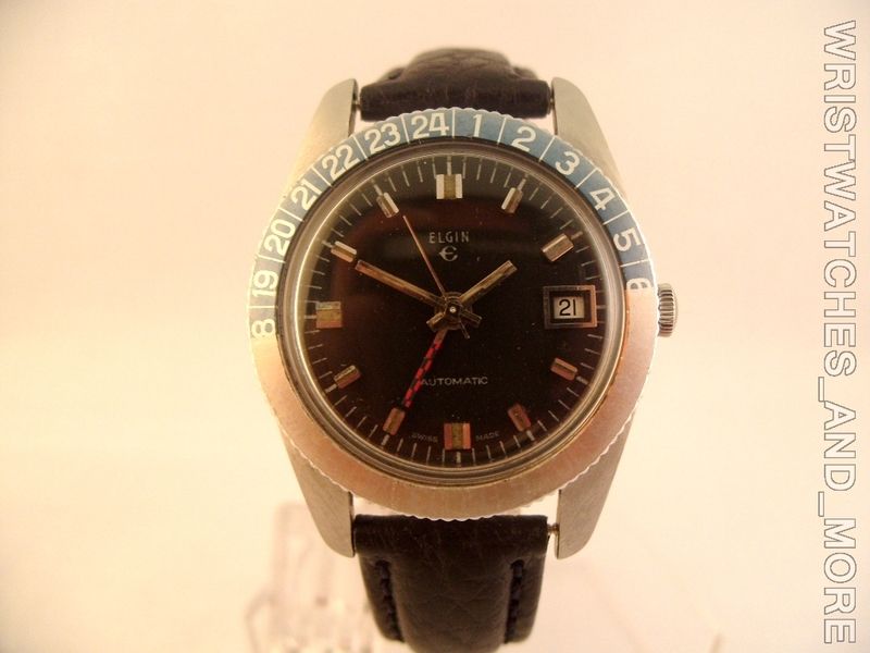 ELGIN GMT VINTAGE. WORLD TIME DISC BACK.  