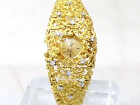 OMEGA SET  UHR & RING  18kt. GOLD  0,72ct. DIAMANTEN ca.64g  