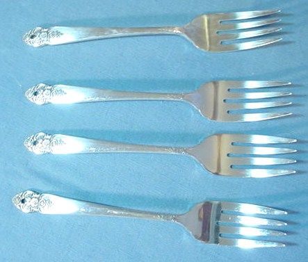 SALAD FORKS IN THE1951 DISTINCTION PATTERN BY ONEIDA PRESTIGE PLATE