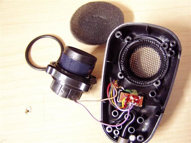   the large grill that protrudes from the front of the microphone