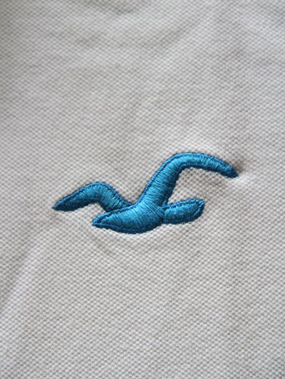 Polo del logotipo de la firma de Hollister